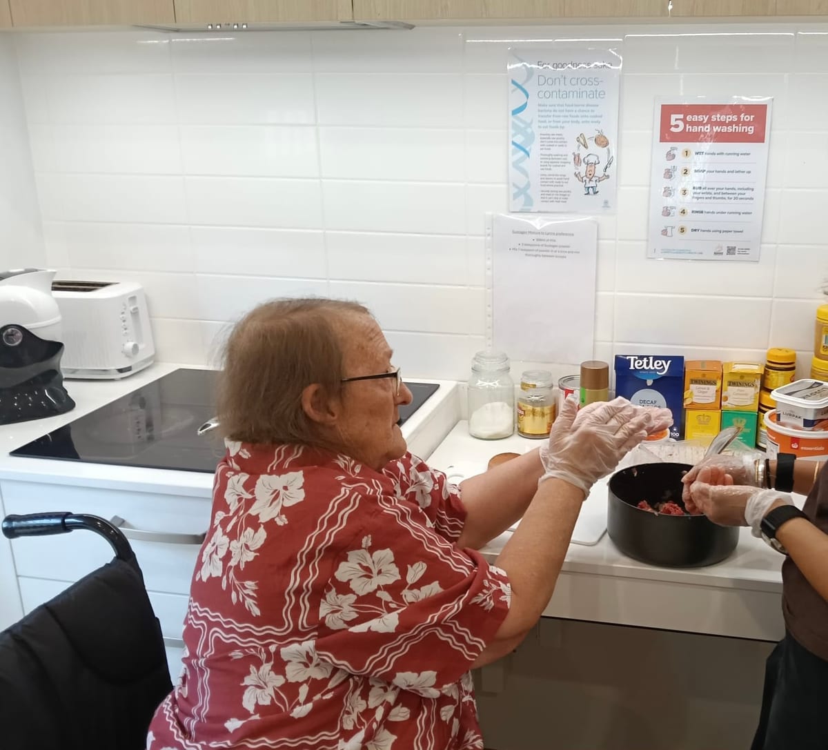 A QB Care resident supported with daily life at home